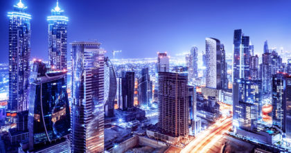 Dubai downtown night scene, UAE, beautiful modern buildings, bright glowing lights, luxurious travel and tourism